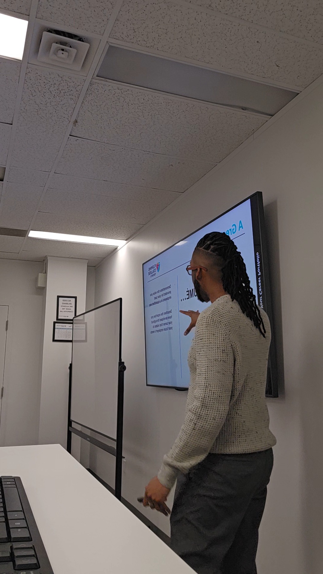 Selmor Reid delivering a business lecture at Fleming College Toronto.